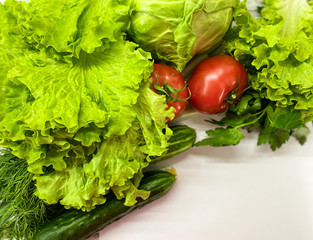 Bright seasonal vegetables on an abstract light surface.