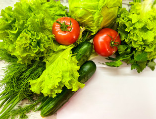 Bright seasonal vegetables on an abstract light surface.