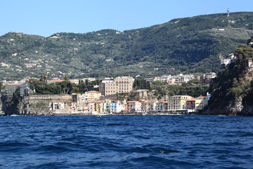 Fototapeta premium Sorrento, Italy: Looking towards the old port area from the sea. 