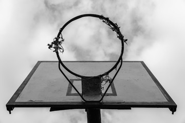 Old basketball goal in black and white