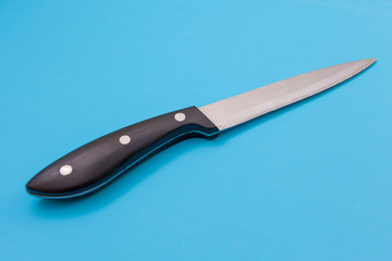 kitchen knife on a blue background