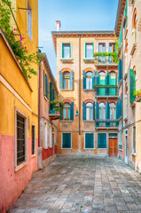 Fototapeta na wymiar Narrow Street in old Venice, Italy