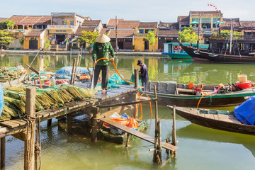 Fototapeta na wymiar Panorama Aerial view of Hoi An ancient town, UNESCO world heritage, at Quang Nam province. Vietnam. Hoi An is one of the most popular destinations in Vietnam. Boat on Hoai river
