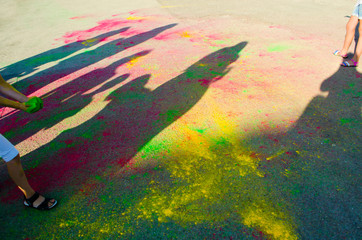 Color running. Participants are painted with multi-colored powder.