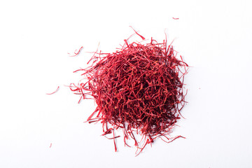 Naklejka premium Dried saffron spice isolated on white background.
