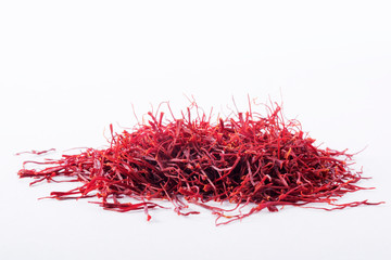 Fototapeta premium Dried saffron spice isolated on white background.