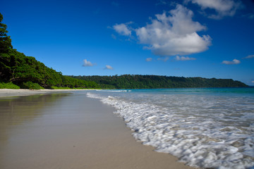 tropical beach with blue sky