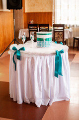Pair of champagne glasses and cake box