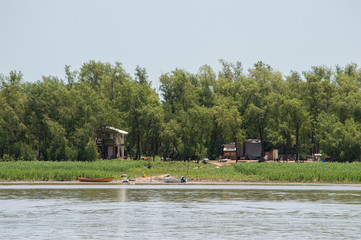 rural landscape with river and house