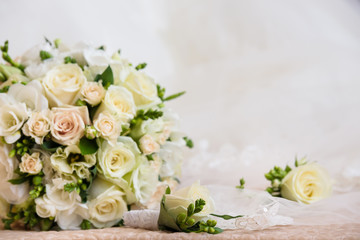 Obraz na płótnie Canvas Bridal wedding bouquet in white and beige colours. Tenderness fashion bouquet