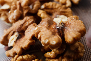 Close-up walnuts, peeled nuts and prepared for adding to the dough