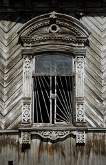 Window in an old wooden building in Chelyabinsk, Russia.