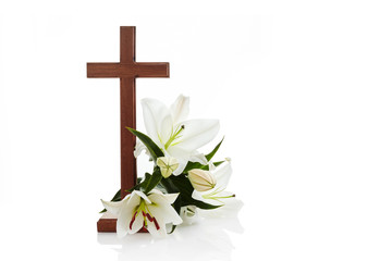 Cross with lilies isolated on white background for decorative design. Spring background. Easter card.