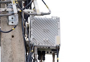 Small Cell 3G, 4G, 5G System. Macro Base Station or Base Transceiver Station. Wireless Communication Antenna Transmitter on electric post. isolated on white background.    