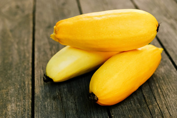 Squash on wooden surface. Seasonal fresh vegetables.