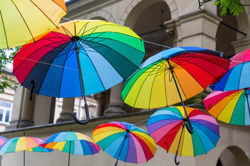 Fototapeta na wymiar Colorful umbrellas in the street