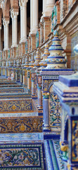 Tiles and decorations in the beautiful Plaza de Espana in Seville. Andalusia, Spain.