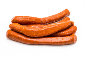 Raw Merguez on a white background