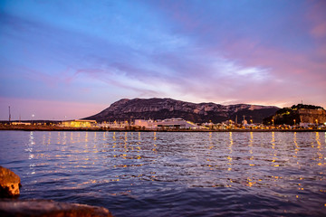 Obraz premium Beautiful panoramic wiew colorful sunset view of Mount and sea