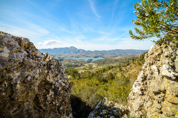 Fototapeta na wymiar Fantastic mountain in the nature reserve of Spain and the dam reservoir
