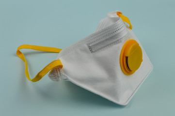 Virus Protective Mask on light blue gray background - coronavirus - covid19