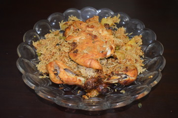 Roasted whole chicken with stuffed rice and potato 