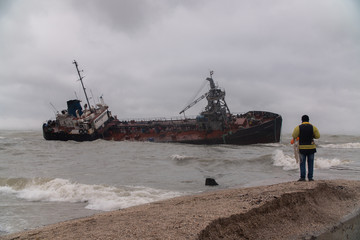 The ship received a hole in the hull and sank near the shore during a storm