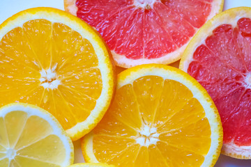 Slices of lemon, orange, grapefruit. Citrus pattern.