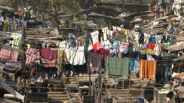 Slum area in India with clothes hanging on lines