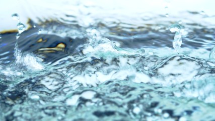 Soft blur focus of Abstract water splash surface filling the frame with the water drop and waving...