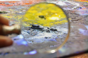 Magnifying glass on the texture of an acrylic paint.