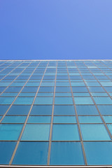 Flat Glass office building over blue sky