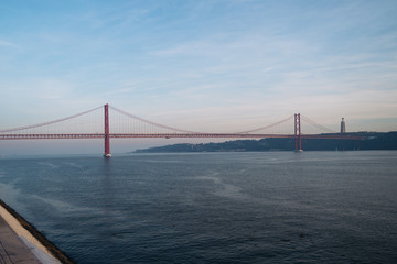 Fototapeta na wymiar The '25 of April' Bridge or ponte 25 de abril in Lisbon.