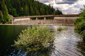 Fototapeta premium Dam lake in the mountains
