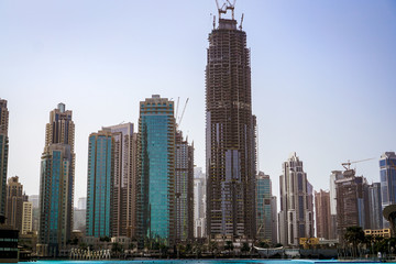 Fototapeta na wymiar Skyscraper Under Construction. The Dubai Mall. 