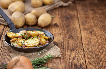 Fresh made Fried Potatoes (selective focus; close-up)