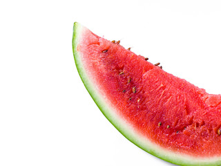 Sliced Watermelon on white plate with spoon and fork stock photo with bright background.
