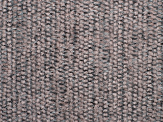 Gray-beige, hairy striped material with visible texture. background or texture, closeup.