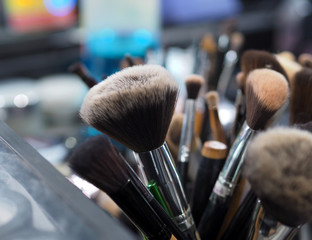 
Brush makeup tool closeup background.