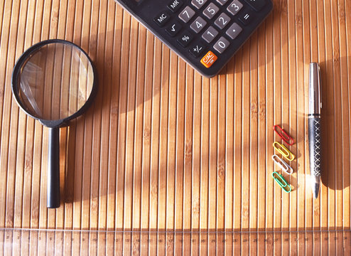 Clear Bamboo desk with some office material