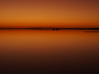 Sunrise on the world's largest salt flat, Uyuni Salt Flat, Salar de Uyuni, Bolivia. Copy space for text