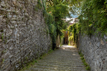 A stone staircase alley in Bellagio, Italy