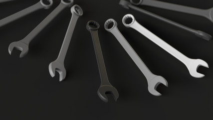 The group of black and white monochromatic spanners on the black background. 3d render.