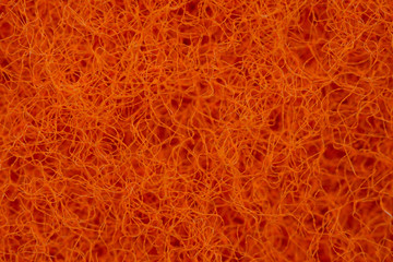 Close-Up Of orange Cleaning Sponge
