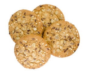 Cereal cookies with seeds and nuts close up isolated on a white background. Healthy food, gluten free diet