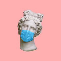 Head Of Apollo In Medical Mask. Novel Coronavirus (2019-nCoV). Concept Of Coronavirus Quarantine.