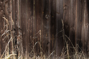 Background backsplash countrystyle wooden fence made from panels in rustic ecological style