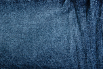 Texture of blue jeans closeup. Denim background