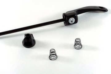 Bicycle repair. Mountain bike workshop. quick release on a white background. Spare parts for a bicycle of a famous manufacturer and brand.