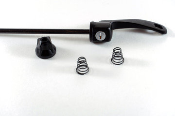 Naklejka premium Bicycle repair. Mountain bike workshop. quick release on a white background. Spare parts for a bicycle of a famous manufacturer and brand.